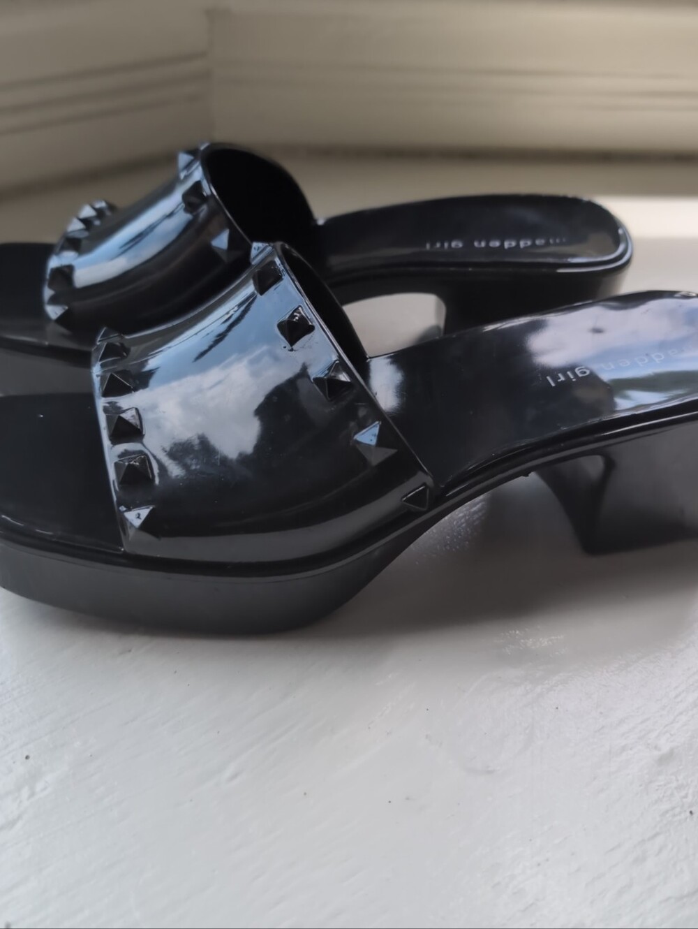 Black Madden Girl studded jelly heeled slide sandals